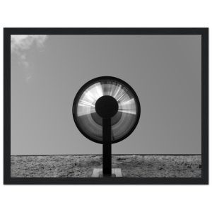 Black and White Photograph of industrial light looking toward the sky. Image by John Pape